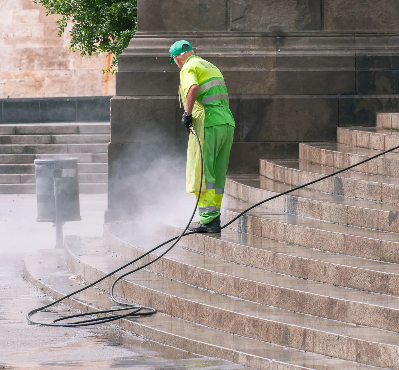 Pressure washing outdoor stone steps